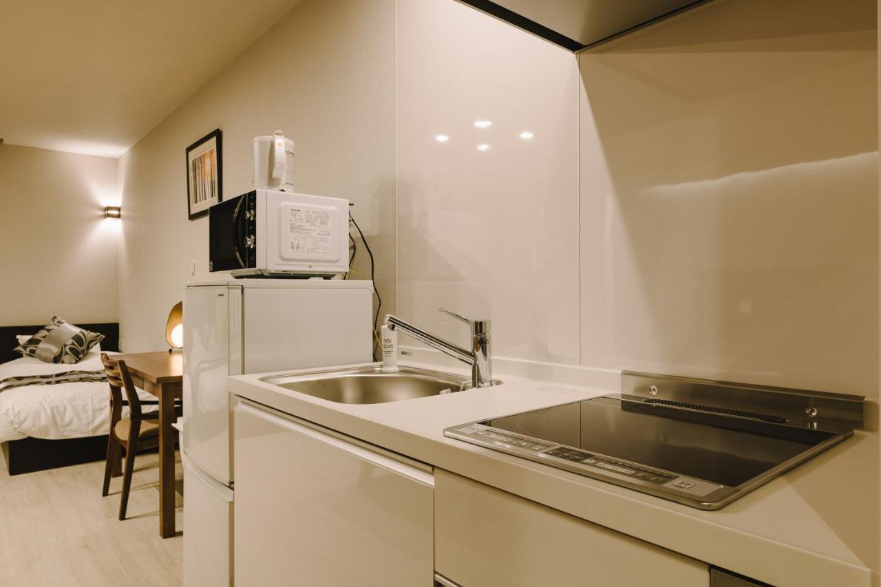 Aparthotel Grand Base Karatsu Ekiminami Extérieur photo